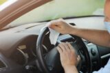Driver Cleans Steering Wheel His Car With Antibacterial Cloth Antiseptic Hygiene Healthcare Concept Selective Focus.jpg